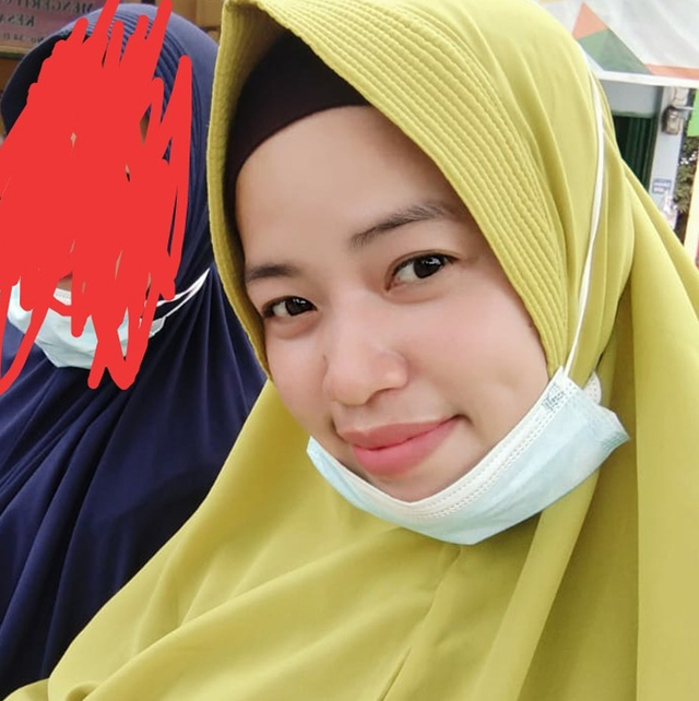 ALMARHUMAH Siti Hamidah semasa hidupnya. Sudah 14 hari sejak ditemukan terkubur di dalam lubang septic tank depan rumahnya, hingga kini keluarga berharap polisi segera menangkap pelakunya. 