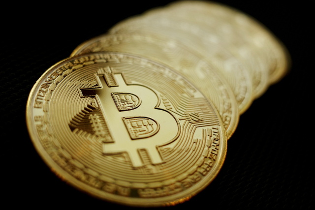 Ilustrasi Bitcoin. Foto: Edgar Su/REUTERS