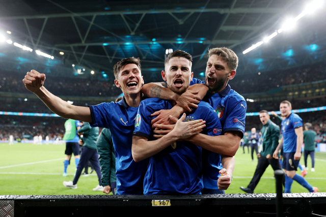 Selebrasi pemain Italia usai menang melawan Spanyol pada pertandingan semi final Euro 2020 di Stadion Wembley, London, Inggris.
 Foto: Carl Recine/REUTERS