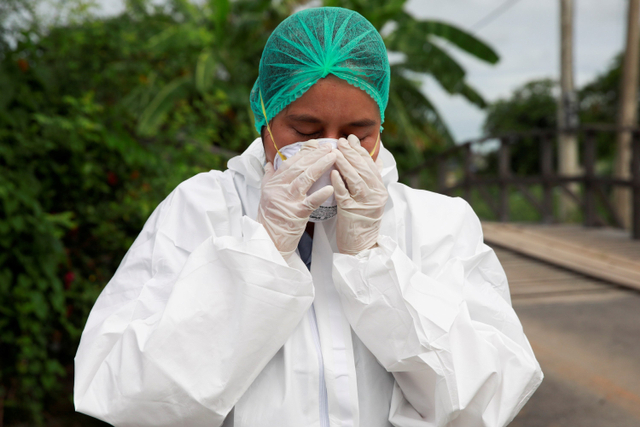 Ilustrasi masker dan alat pelindur diri (APD), Thailand.  Foto: Soe Zeya Tun/REUTERS