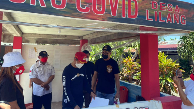 Bupati Minut Jadi Tenaga Penyemprotan Disinfektan di Terminal Airmadidi (42660)
