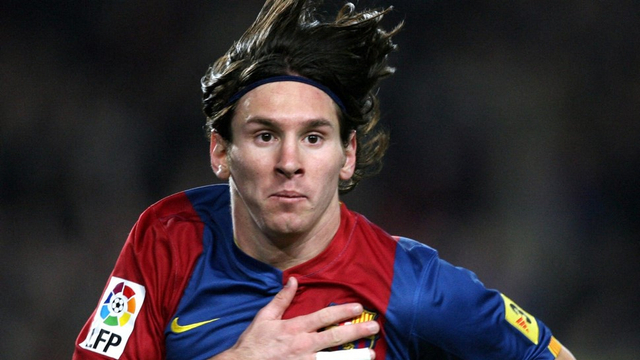 Pemain Barcelona asal Argentina Lionel Messi usai mencetak gol ke gawang Real Madrid, 10 Maret 2007. Foto: LLUIS GENE/AFP