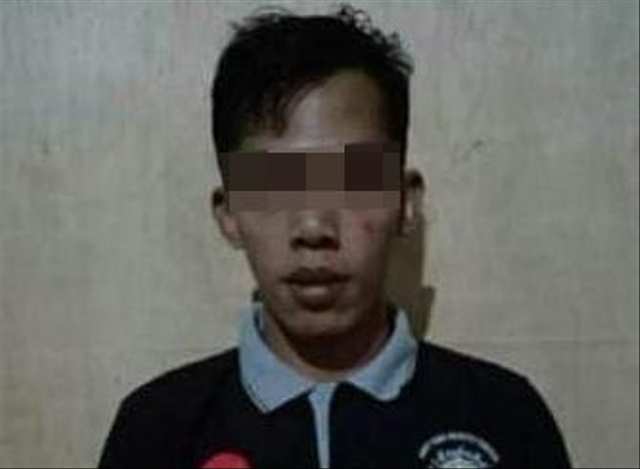 Tersangka pembunuhan satu keluarga di Solam Raya, Sintang, Kalimantan Barat. Foto: Dok Hi!Pontianak