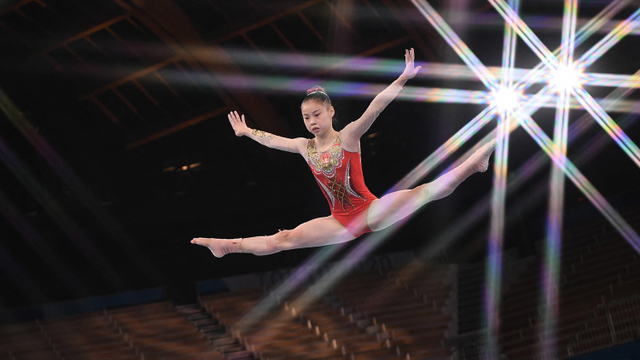 Atlet senam asal China, Guan Chenchen di Olimpiade 2020. Foto: Lionel BONAVENTURE / AFP