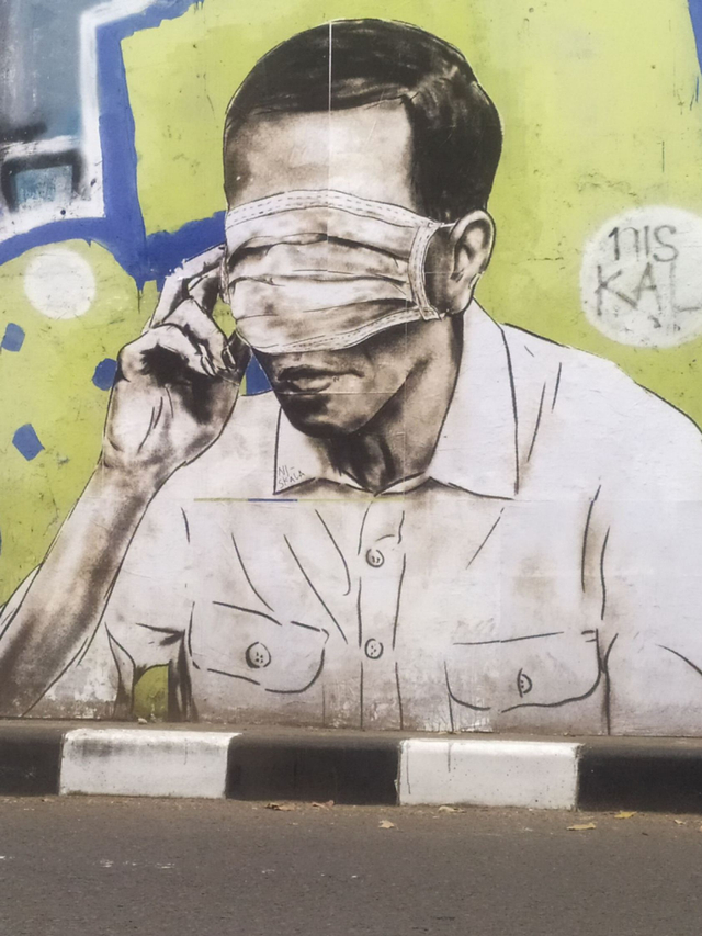 Sebuah mural mirip Presiden Joko Widodo di Flyover Pasupati Kota Bandung. Foto: Rachmadi Rasyad/kumparan