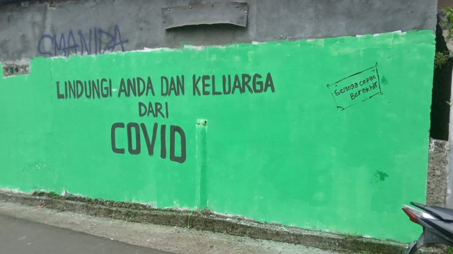 Mural 'Rakyat Butuh Sesuap Nasi' di Bogor diganti 'Lindungi Anda dan Keluarga dari COVID'. Foto: Dok. Istimewa