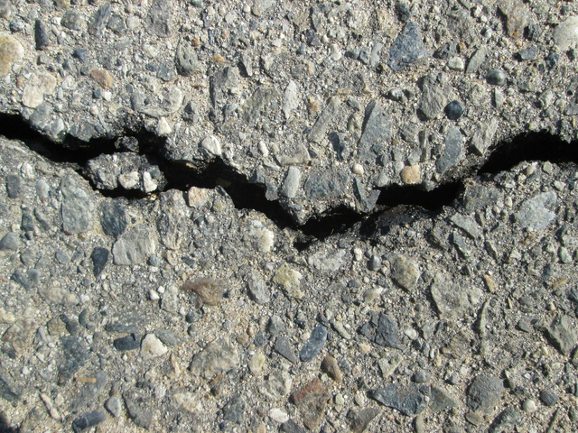 https://pixabay.com/photos/asphalt-crack-background-line-road-315756/