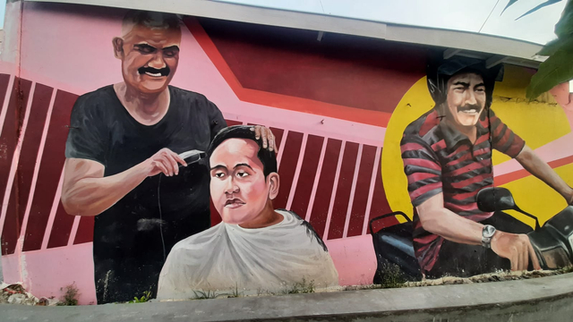 Mural bergambar mantan Wali Kota Solo FX Hadi Rudyatmo sedang memangkas rambut Gibran Rakabuming