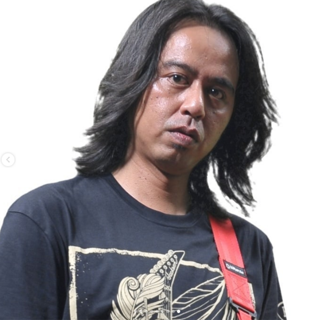 Gitaris band Sucker Head, Sumedi Marmamo atau Medi. Foto: Instagram/suckerheadband