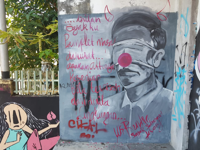 Mural mirip wajah Presiden Jokowi di Pangkalpinang.