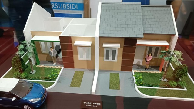 Miniatur rumah pada pameran perumahan di acara BTN Properti Expo 2022, Minggu (15/5). Foto: Muhammad Darisman/kumparan