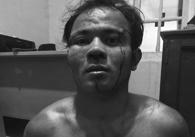 Pemuda di Sambas diamankan lantaran memotong leher ayahnya hingga putus. Foto: Dok. Istimewa