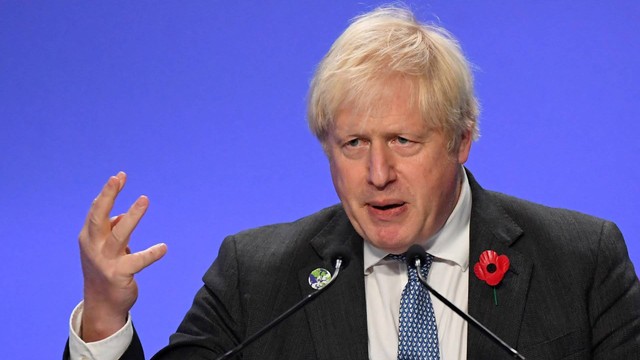 Perdana Menteri Inggris Boris Johnson berbicara di Konferensi Perubahan Iklim PBB COP26 di Glasgow, Inggris. Foto: ANDY BUCHANAN/AFP