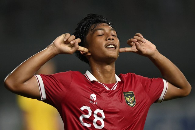 Pemain Timnas Indonesia U-19 Rabbani Tasnim Siddiq berselebrasi usai mencetak gol ke gawang Timnas Filipina U-19 dalam laga penyisihan Grup A Piala AFF U-19 2022 di Stadion Patriot Candrabhaga, Bekasi, Jawa Barat, Jumat (8/7/2022). Foto: Aditya Pradana Putra/ANTARA FOTO