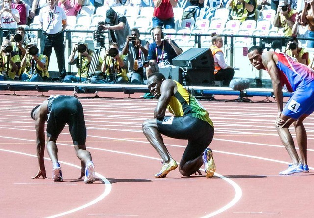Usain Bolt saat mengikuti lomba lari 100 meter. Foto: unsplash