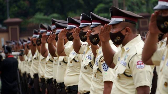 Suasana upacara Hari Ulang Tahun Ke-41 Satpam di Lapangan Bhayangkara Polri, Jakarta, Rabu (2/2/2022). Foto: Kumparan.com/Jamal Ramadhan