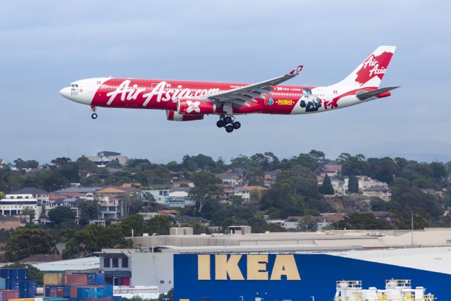 Fasilitas Pesawat Air Asia, Foto: Unsplash/Troy Mortier