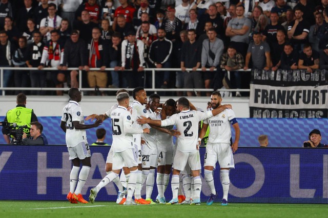 Real Madrid players celebrate after scoring a goal against Eintracht Frankfurt during the European Super Cup match at the Helsinki Olympic Stadium, Helsinki, Finland.  Photo: Kai Pfaffenbach/REUTERS