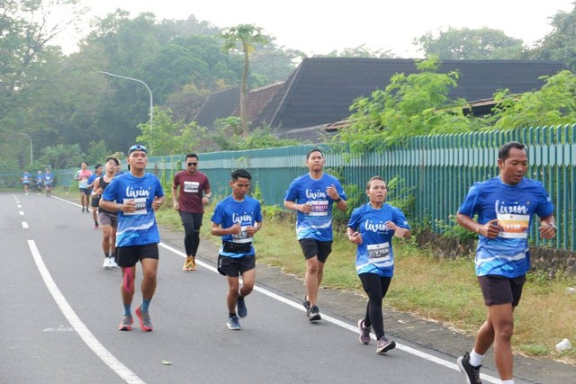 Para pelari di Mandiri Jogja Marathon 2022. Foto: Panji Purnandaru/kumparan