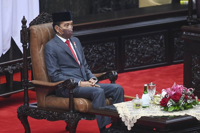 Presiden Joko Widodo menghadiri rapat Paripurna pembukaan masa persidangan I DPR tahun sidang 2022-2023 di Gedung Nusantara, Kompleks Parlemen, Senayan, Jakarta, Selasa (16/8/2022).  Foto: Galih Pradipta/ANTARA FOTO