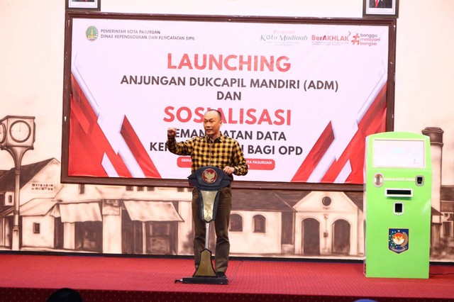 Launching Anjungan Dukcapil Mandiri (ADM) dan Sosialisasi Pemanfaatan Data Kependudukan Bagi Organisasi Pemerintah Daerah di Kota Pasuruan, Jawa Timur, Sabtu (27/8). Foto: Dukcapil Kemendagri