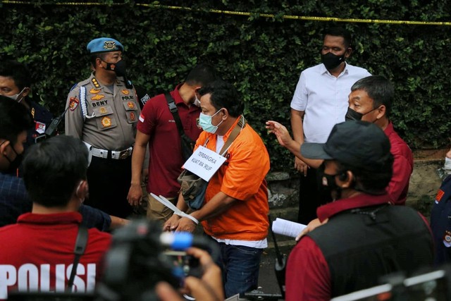 Kuat Ma'ruf saat jalani rekonstruksi di rumah dinas Ferdy Sambo, di Kompleks Polri Duren Tiga, Jakarta Selatan, Selasa (30/8/2022). Foto: Aditia Noviansyah/kumparan