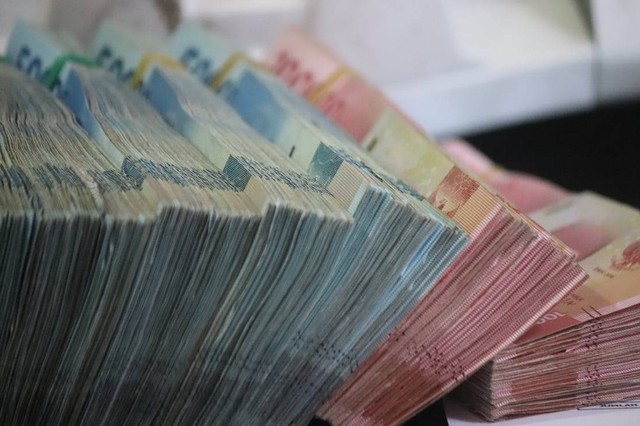 Ilustrasi uang warisan. Foto: Unsplash