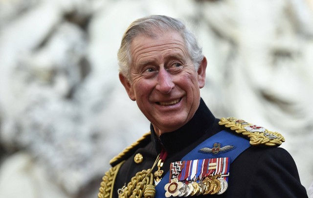 Pangeran Charles menghadiri resepsi setelah upacara peringatan untuk menandai berakhirnya operasi tempur Inggris di Afghanistan di Guildhall, London, Jumat (13/3/2015). Foto: Toby Melville/AFP