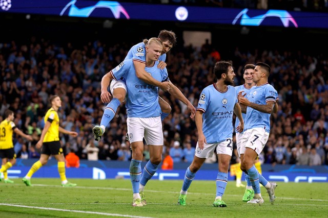 Selebrasi pemain Manchester City usai mencetak gol ke gawang Borussia Dortmund pada pertandingan Grup G Liga Champions di Stadion Etihad, Manchester, Inggris.
 Foto: Jason Cairnduff/REUTERS