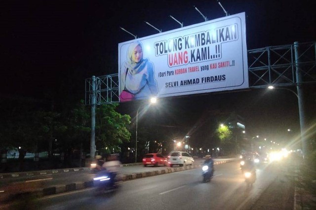 Heboh foto terlapor penipuan di Makassar dipajang di Billboard. Foto: Dok. Istimewa