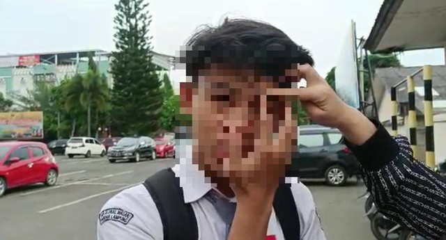 Seorang pelajar melaporkan gurunya ke polisi terkait kasus dugaan penganiayaan. | Foto: ist