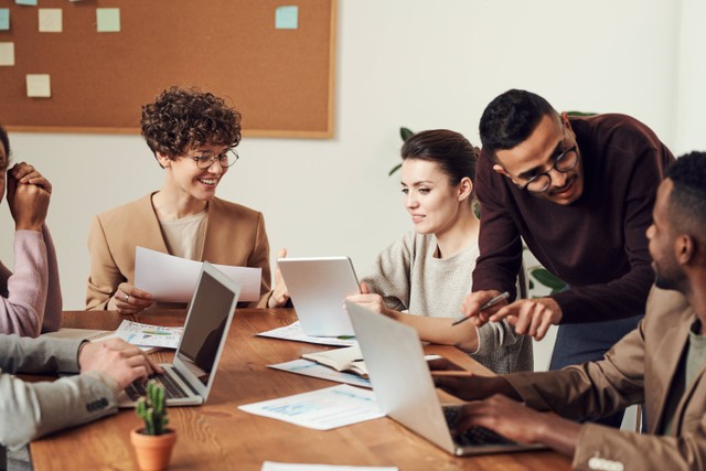 Source: https://www.pexels.com/photo/group-of-people-gathered-around-wooden-table-3184360/