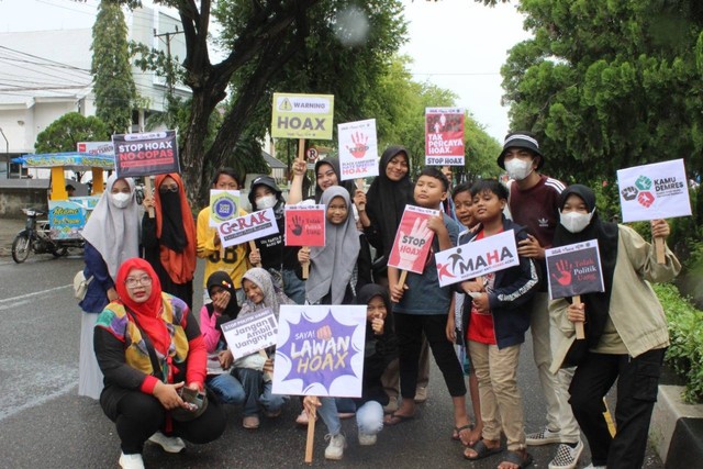 Kampanye antihoaks di arena car free day Banda Aceh. Foto: dok. Destika  