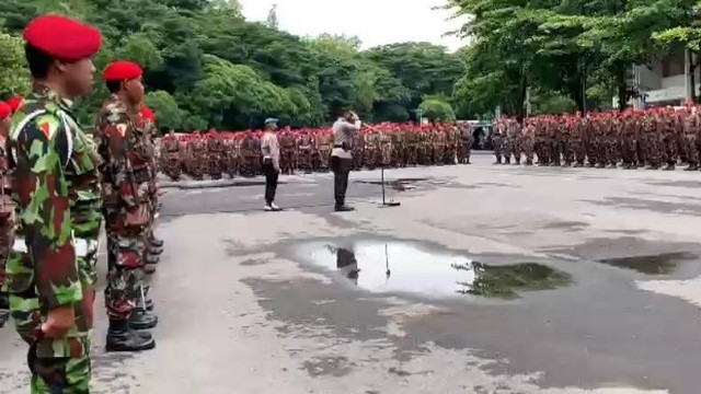 Kapolresta Solo, Kombes Polisi Iwan Saktiadi memimpin apel 1.300 Kokam dari Soloraya, Rabu (16/11/2022). FOTO: Agung Santoso