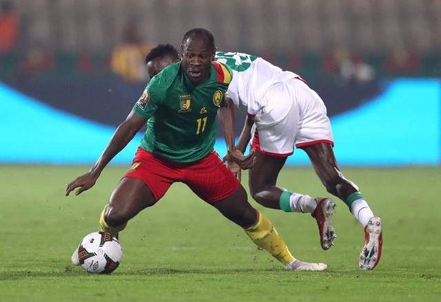 Christian Bassogog Kamerun beraksi saat melawan Burkina Faso di pertandingan Playoff Tempat Ketiga di Stadion Ahmadou Ahidjo, Yaounde, Kamerun, 5 Februari 2022. Foto: Mohamed Abd El Ghany/REUTERS