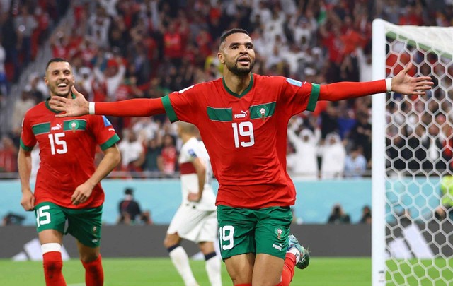 Pemain Maroko Youssef En-Nesyri merayakan gol pertama mereka pada pertandingan Perempat Final Maroko melawan Portugal di Stadion Al Thumama, Doha, Qatar - 10 Desember 2022. Foto: Carl Recine/REUTERS
