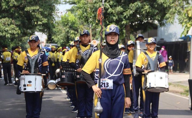 Kontingen drumband PDBI Lampung saat mengikuti Kejurnas Drumband di Madiun, Jawa Timur. | Foto : Pemprov Lampung