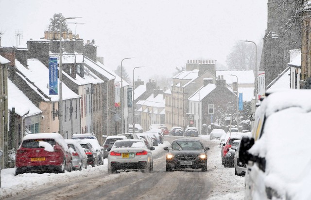 Suasana usai badai salju di Auchterarder, Skotlandia tengah, pada 18 Februari 2022. Foto: Andy Buchanan/AFP