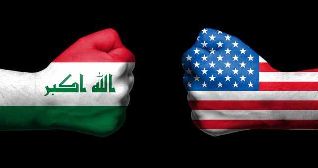 Flags of Iraq and United States of America - USA relations concept. Source: Moab Republic/shutterstock