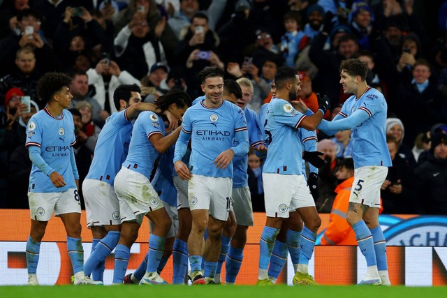 Selebrasi pemain Manchester City usai mencetak gol ke gawang Tottenham Hotspur pada pertandingan lanjutan Liga Inggris di Stadion Etihad, Manchester, Inggris. Kamis (19/1/2023).
 Foto: Lee Smith/REUTERS