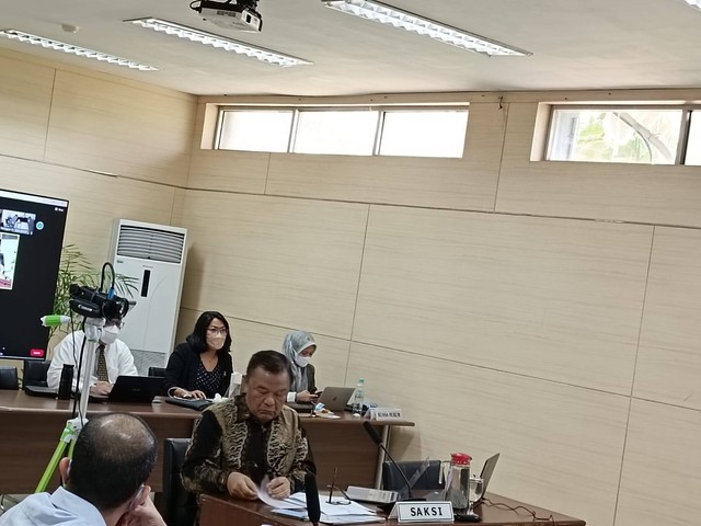 Direktur Eksekutif GIMNI Sahat Sinaga dipanggil sebagai saksi pada Sidang Majelis KPPU Foto: Akbar Maulana/kumparan