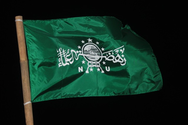 bendera Nahdlatul Ulama | sumber: https://unsplash.com/photos/Mufid Majnun
