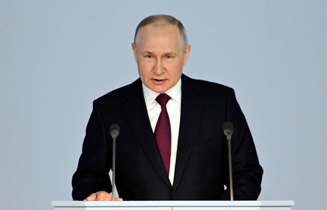 Presiden Rusia Vladimir Putin menyampaikan pidato tahunannya kepada Majelis Federal di Moskow, Rusia, Rabu (21/2/2023). Foto: Sputnik/Pavel Bednyakov/Kremlin via REUTERS