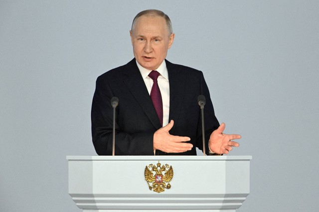 Presiden Rusia Vladimir Putin menyampaikan pidato tahunannya kepada Majelis Federal di Moskow, Rusia, Rabu (21/2/2023). Foto: Sputnik/Pavel Bednyakov/Kremlin via REUTERS