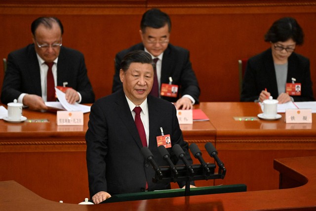 Presiden China Xi Jinping berbicara selama sesi penutupan Kongres Rakyat Nasional (NPC) di Aula Besar Rakyat di Beijing pada 13 Maret 2023. Foto: Noel Celis/Pool/AFP