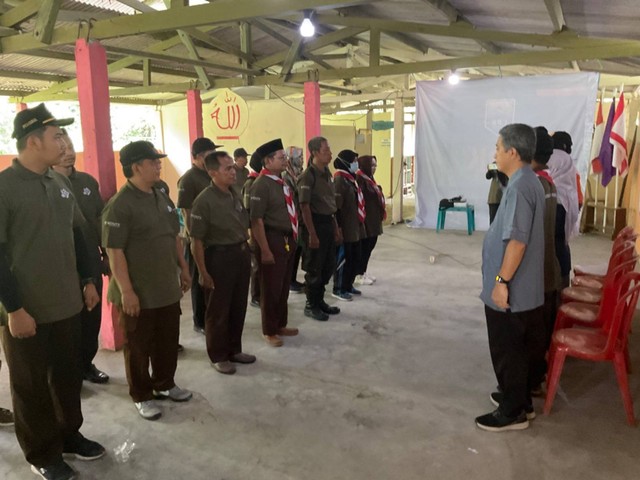 Gambar 2. Pengukuhan Satgas Kampung Pramuka