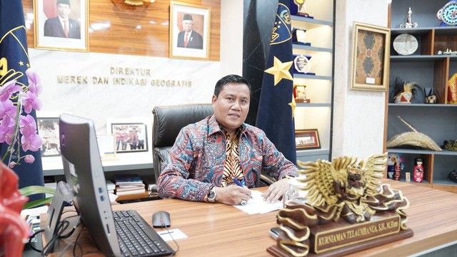 Direktur Merek dan IG DJKI Kurniaman Telaumbanua di Kantor DJKI Jakarta, pada Jumat (17/3/2023). Foto: DJKI