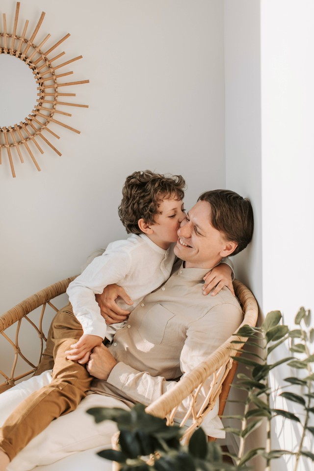 https://www.pexels.com/photo/father-getting-a-kiss-on-the-cheek-from-his-son-4609082/