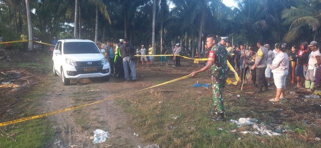 Mobil dinas Polri yang di dalamnya terdapat jenazah Briptu RF. Dok: Ist.