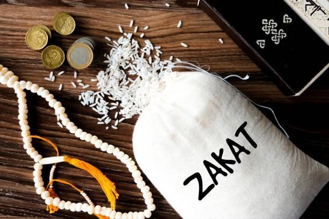 Penerima Zakat Fitrah, Foto: Unsplash.